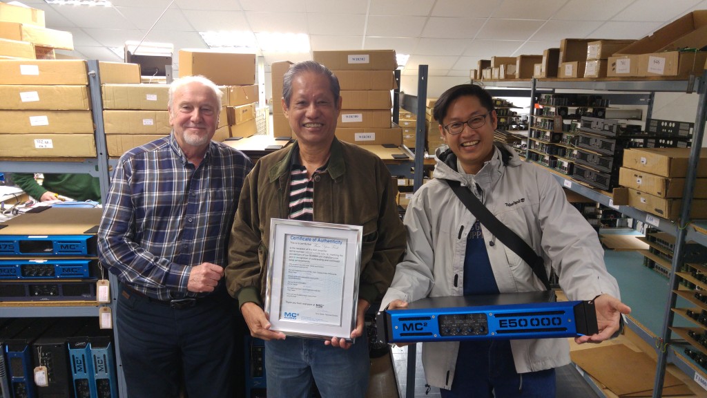 From L-R: Terry Clarke, Director MC2; Thim Yan Fook holding his 50k certificate ; Yew Kay Yan Fook holding the E50,000 amp.